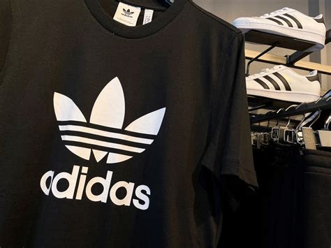 adidas is investigating allegations of large-scale bribery in china.|adidas china news.